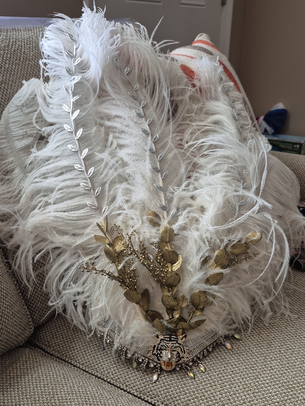 Decorative White Feather Headdress with Gold Leaf Accents